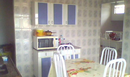 vista da porta do fundo da cozinha para copa a direita e dispena a esquerda FotoID 18186